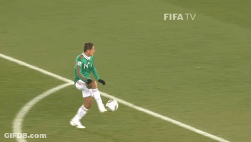 A Man Wearing A Green Jersey With The Number 14 On It GIF