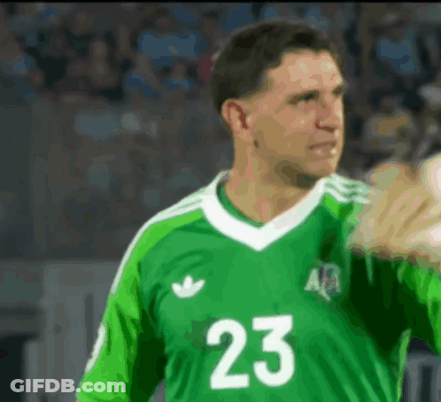 A Man Wearing A Green Jersey With The Number 23 GIF
