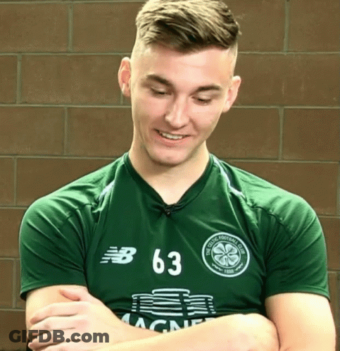 A Man Wearing A Green Jersey With The Number 63 GIF