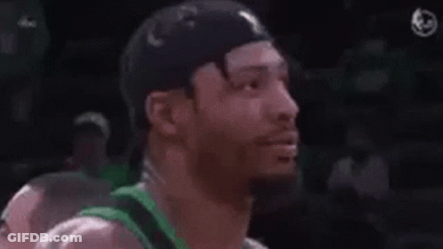 A Man Wearing A Green Jersey With The Words Fuck Marcus Smart GIF