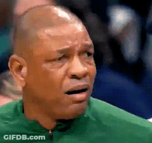 A Man Wearing A Green Shirt Is Crying GIF