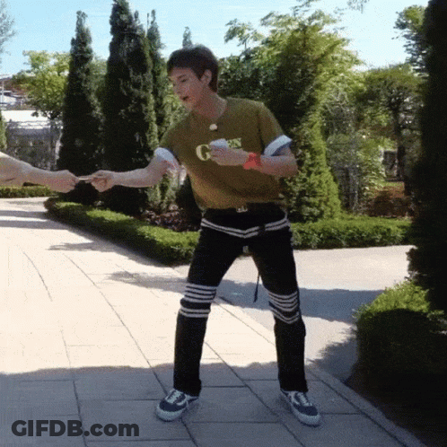 A Man Wearing A Green Shirt That Says G On It GIF