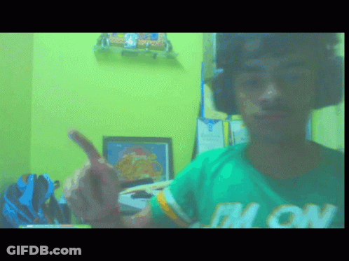 A Man Wearing A Green Shirt That Says " I 'M On " On It GIF