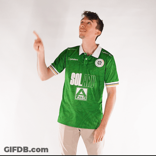 A Man Wearing A Green Shirt That Says Solarv Aldi GIF