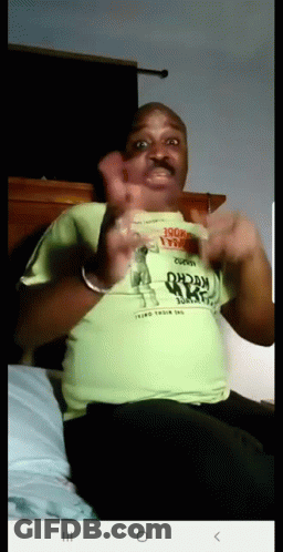 A Man Wearing A Green Shirt That Says " Third Their Last " On It GIF