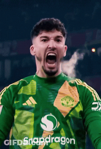 A Man Wearing A Green Shirt With Snapdragon On The Front GIF