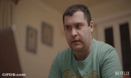 A Man Wearing A Green Shirt With The Word Yes Written On It GIF