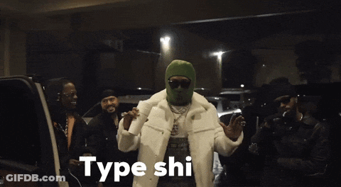 A Man Wearing A Green Ski Mask Is Holding A Cup Of Coffee And Says Type Shi GIF