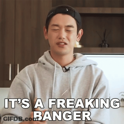 A Man Wearing A Grey Hoodie And A Black Hat Says It 'S A Freaking Banger GIF