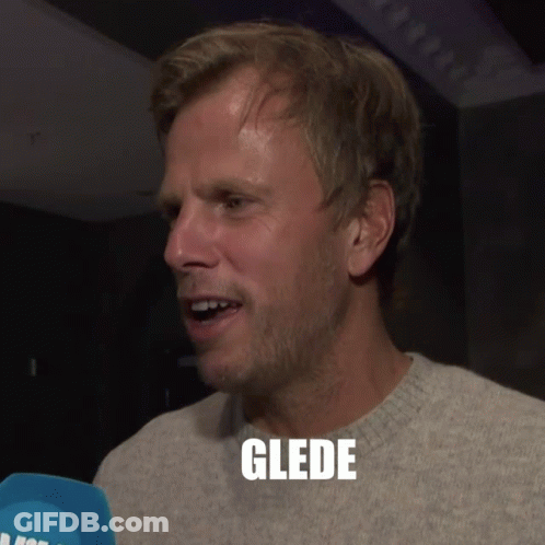 A Man Wearing A Grey Sweater With The Word Glede Above His Head GIF