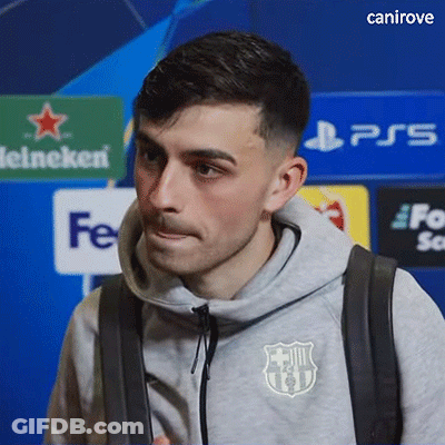 A Man Wearing A Grey Sweatshirt With A Fcb Logo On It GIF