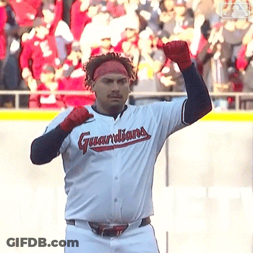 A Man Wearing A Guardians Jersey Is Standing On A Baseball Field GIF