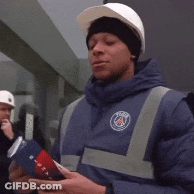 A Man Wearing A Hard Hat And A Blue Jacket That Says Psg On It GIF