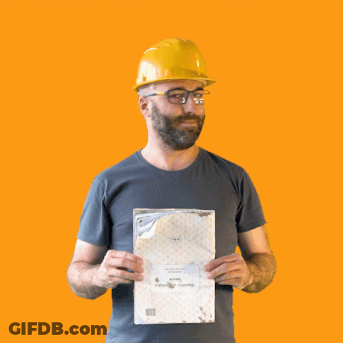 A Man Wearing A Hard Hat And Glasses Is Holding A Piece Of Paper That Says " Swedish Airways " GIF