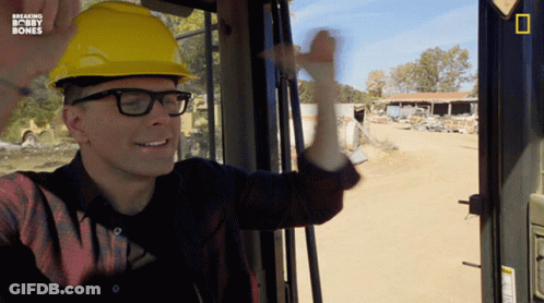 A Man Wearing A Hard Hat And Glasses Is On A Breaking Bobby Bones Tv Show GIF
