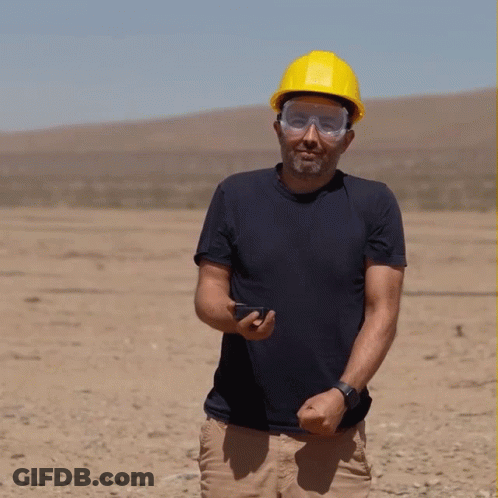 A Man Wearing A Hard Hat And Safety Goggles Says Oh Boy GIF