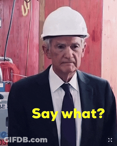 A Man Wearing A Hard Hat Says Say What GIF