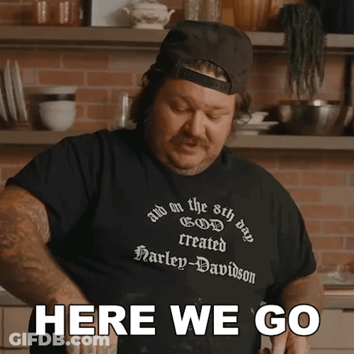 A Man Wearing A Harley Davidson T-Shirt Says " Here We Go " GIF