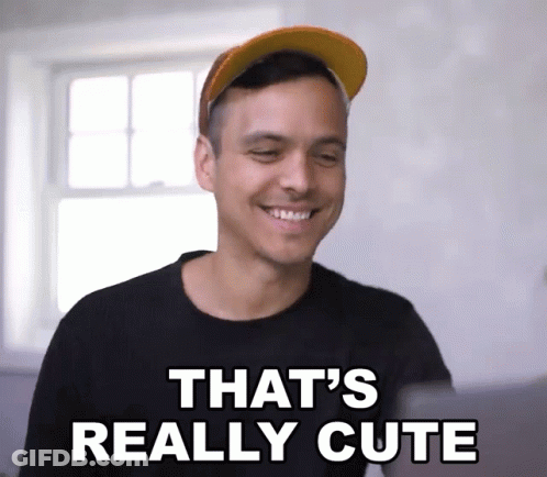 A Man Wearing A Hat And A Black Shirt Says That 'S Really Cute GIF