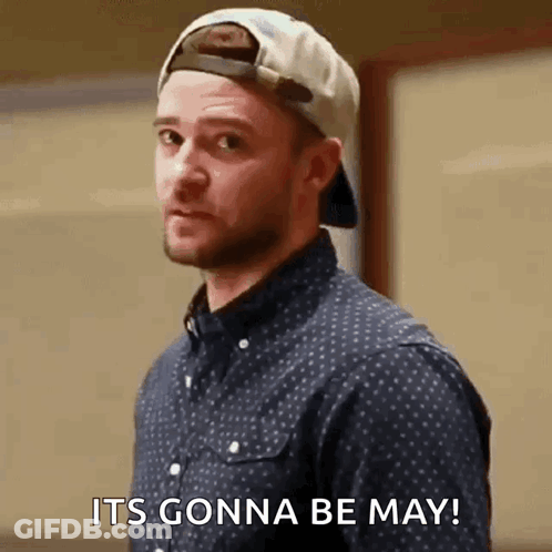 A Man Wearing A Hat And A Blue Shirt Says It 'S Gonna Be May GIF