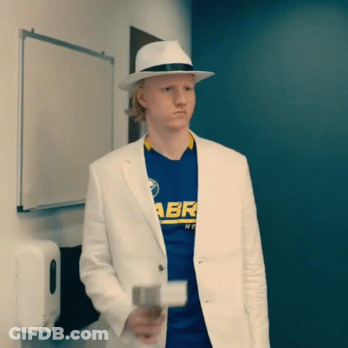 A Man Wearing A Hat And A Blue Shirt With Abr On It GIF