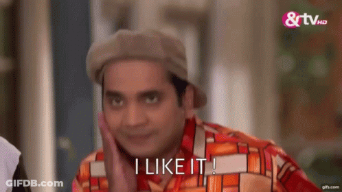 A Man Wearing A Hat And A Colorful Shirt Is Making A Funny Face And Saying `` I Like It '' . GIF