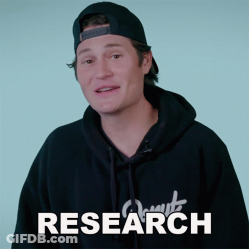 A Man Wearing A Hat And A Hoodie With The Word Research Written On It GIF