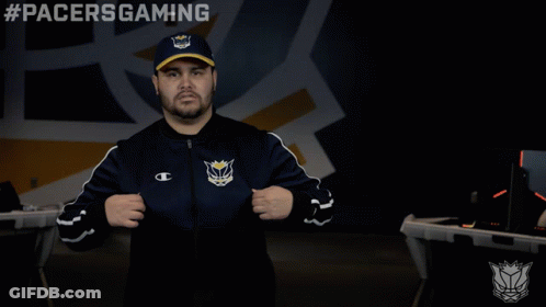 A Man Wearing A Hat And A Jacket With #Pacersgaming Written Above Him GIF