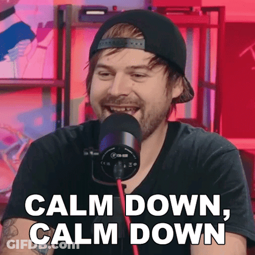 A Man Wearing A Hat And A Microphone Says Calm Down GIF