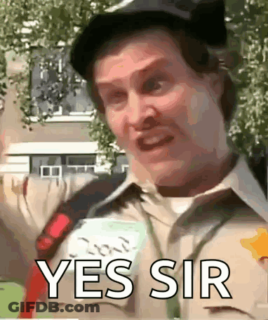 A Man Wearing A Hat And A Name Tag That Says Yes Sir GIF