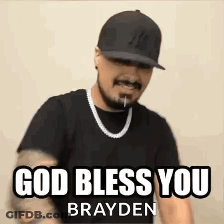 A Man Wearing A Hat And A Necklace Is Making A Funny Face And Saying `` God Bless You Brayden '' . GIF