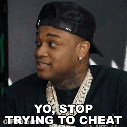 A Man Wearing A Hat And A Necklace Says Yo Stop Trying To Cheat GIF