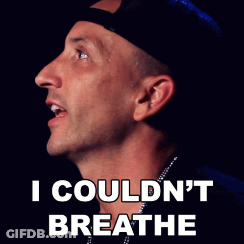 A Man Wearing A Hat And A Necklace With The Words I Couldn 'T Breathe Below Him GIF
