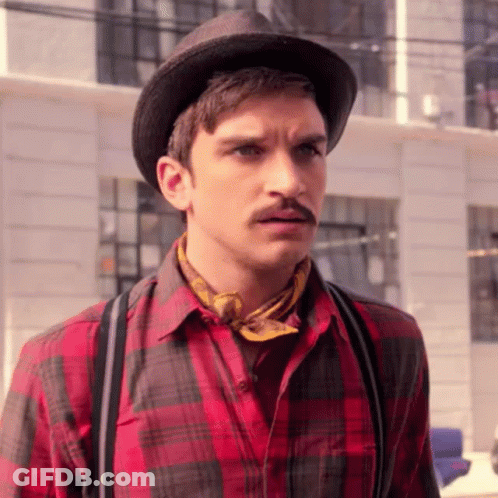 A Man Wearing A Hat And A Plaid Shirt GIF