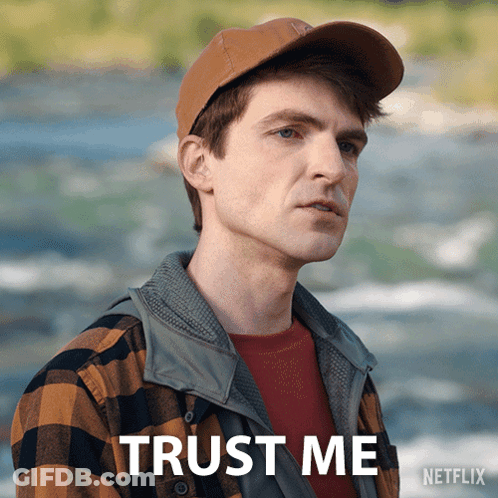 A Man Wearing A Hat And A Plaid Shirt Says Trust Me On A Netflix Poster GIF