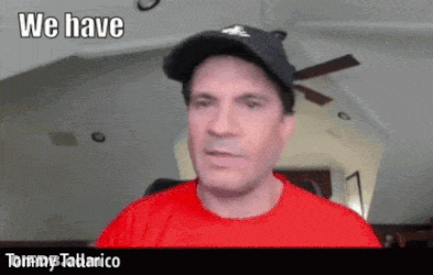 A Man Wearing A Hat And A Red Shirt Says " We Have " GIF