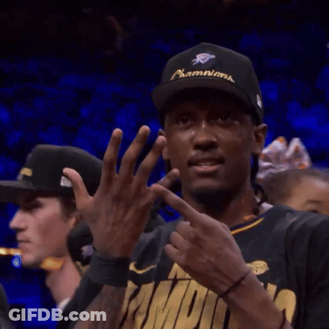 A Man Wearing A Hat And A Shirt That Says ' Champs ' On It GIF