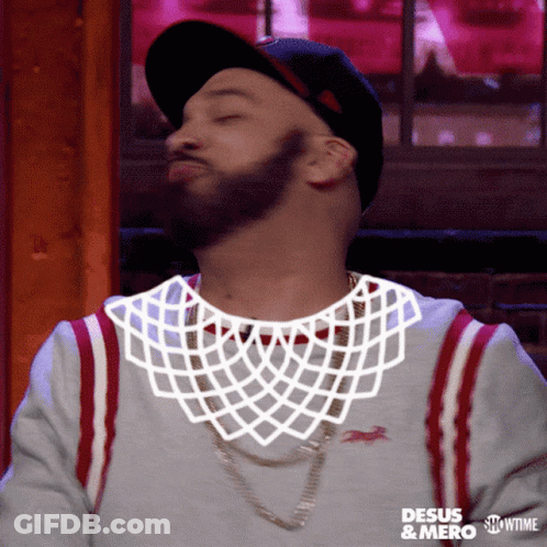 A Man Wearing A Hat And A Shirt That Says Desus & Mero GIF