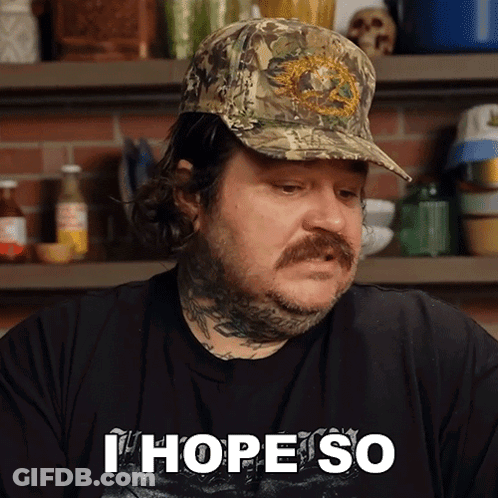 A Man Wearing A Hat And A Shirt That Says I Hope So GIF