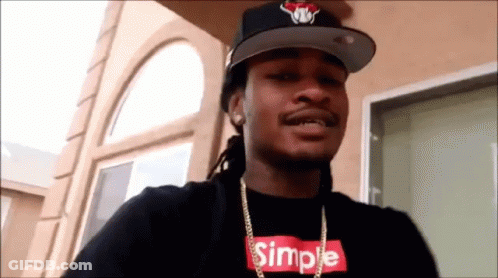 A Man Wearing A Hat And A Simple T-Shirt GIF