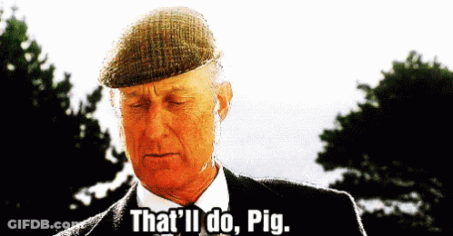 A Man Wearing A Hat And A Suit Says That 'Ll Do Pig GIF