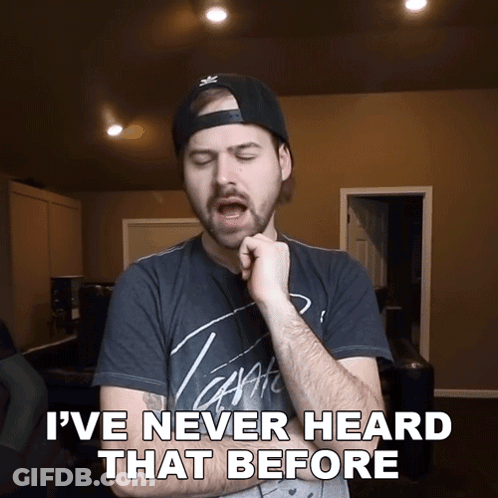 A Man Wearing A Hat And A T-Shirt That Says " I 'Ve Never Heard That Before " GIF