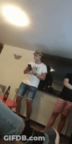 A Man Wearing A Hat And A T-Shirt That Says ' Y ' On It GIF
