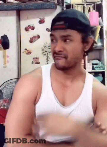 Man Standing In Front Of Refrigerator GIF
