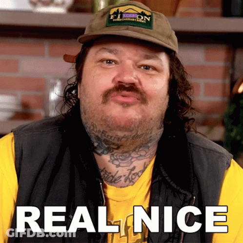 A Man Wearing A Hat And A Vest Says Real Nice GIF