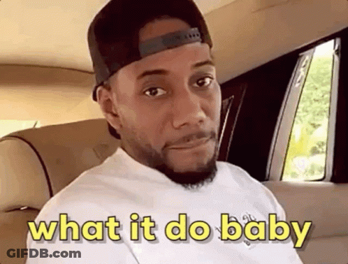 A Man Wearing A Hat And A White Shirt Is Sitting In A Car . GIF