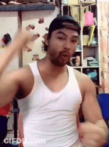 Man Wearing Hat And White Tank Top GIF