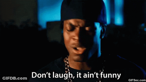 A Man Wearing A Hat And Chains Is Saying " Do N't Laugh It Ain 'T Funny " GIF