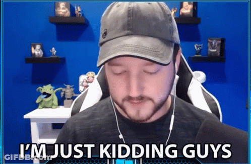 A Man Wearing A Hat And Ear Buds Says I 'M Just Kidding Guys GIF