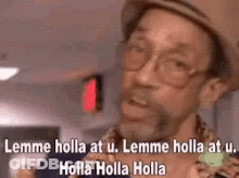 A Man Wearing A Hat And Glasses Is Saying Lemme Holla At U . GIF